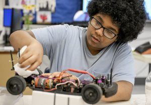 Student works on remote control car