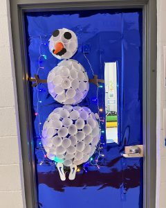 A snowman on a door