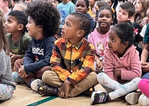 Young students watching a presentation